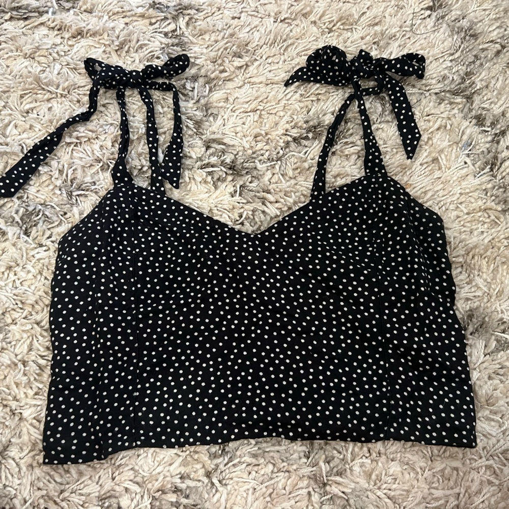 Black and white polkadot crop top with adjustable tie shoulders